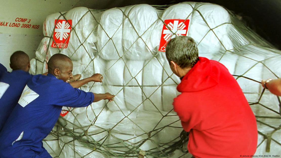 Caritas workers unloading relief cargo for a volcano eruption in Congo