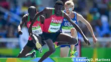 17.08.2016 *** 2016 Rio Olympics - Athletics - Final - Men's 3000m Steeplechase Final - Olympic Stadium - Rio de Janeiro, Brazil - 17/08/2016. Conseslus Kipruto (KEN) of Kenya competes ahead of Evan Jager (USA) of USA and Ezekiel Kemboi (KEN) of Kenya. REUTERS/Dylan Martinez FOR EDITORIAL USE ONLY. NOT FOR SALE FOR MARKETING OR ADVERTISING CAMPAIGNS. © Reuters/D. Martinez