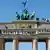 Identitaere Bewegung auf dem Brandenburger Tor in Berlin