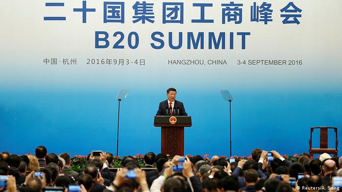 Chinas Präsident Xi Jinping vor dem G20-Logo
