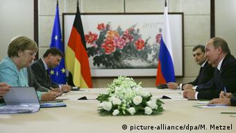 Angela Merkel with Vladimir Putin Copyright: picture-alliance/dpa/M. Metzel