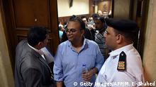 20.4.2016 *** Renowned human rights activist Hossam Bahgat (C) leaves the courtroom in Cairo as an Egyptian court examines a request to issue a travel ban and freeze the assets of him and a fellow rights activist on April 20, 2016. / AFP / MOHAMED EL-SHAHED (Photo credit should read MOHAMED EL-SHAHED/AFP/Getty Images) Copyright: Getty Images/AFP/M. El-Shahed