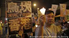 抗议暴力 香港烛光晚会声援乌坎