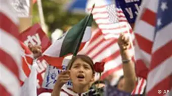 A young unidentified girl waves a Mexican flag during an immigration rally in Los Angeles, Monday, April 10, 2006. (AP Photo/Kevork Djansezian)