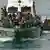 Ilegalni migranti na brodu, koje je iz mora spasila španjolska obalna straža