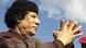 Gadhafi with folded hands Gadhafi with folded hands