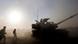Israelischer Panzer an der Grenze zum Gazastreifen (Quelle: AP) Israelischer Panzer an der Grenze zum Gazastreifen (Quelle: AP)