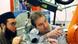 We see head and shoulder shot of Indian man Amit Kulkarni turned to the camera, while sitting at his computer desk. We see head and shoulder shot of Indian man Amit Kulkarni turned to the camera, while sitting at his computer desk.