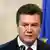 Виктор Янукович на фоне флага ЕС