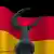 Ein montiertes Symbolbild zur Islamkonferenz mit der deutschen Flagge (Foto: AP)