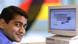 indian man sitting at computer with germany flag indian man sitting at computer with germany flag