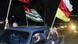 Waving the flags of Russia, Abkhazia and South Ossetia, local residents ride a car as they celebrate the independence referendum in South Ossetia, Nov. 12, 2006 Waving the flags of Russia, Abkhazia and South Ossetia, local residents ride a car as they celebrate the independence referendum in South Ossetia, Nov. 12, 2006