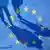 Коллаж - тени на фоне звезд, которые символизируют Евросоюз