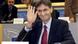 Leonard Orban waving to photographers in the European parliament Leonard Orban waving to photographers in the European parliament