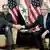 Gemeinsamer Handschlag: George W. Bush und Al Maliki in Amman