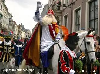 A Sinterklaas parade in 2003 features many of the helpers in black-face