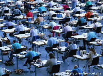 Rows of students taking exams