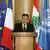 Libanons Premierminister Fuad Siniora vor Flaggen