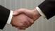 Two men shaking hands Two men shaking hands