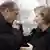 Schon fast Tradition: Chirac begrüßt Merkel mit Handkuss (Quelle: dpa)