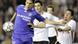 Ballack pushes away a Valencia player in a Champions League match Ballack pushes away a Valencia player in a Champions League match