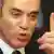 Former world chess champion Garry Kasparov gestures as he speaks to the media