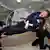 На земята Стивън Хокинг е прикован към инвалидния стол
