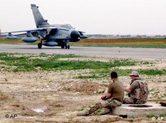 Tornado jet on the ground with soldiers