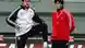 Trainingsszene: Es sieht aus, als träte NationalmannschaftskapitänMichael Ballack Bundestrainer Joachim Löw in den Allerwertesten. Quelle: dpa