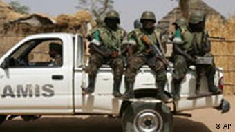 Armed African Union peacekeepers on truck