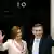 Britain's newly appointed Prime Minister Gordon Brown, right, and his wife Sarah wave as they pose outside 10, Downing Street in London, Wednesday June 27, 2007.