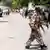 AU soldier walking through the streets of Mogadishu