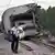 Пассажир уносит вещи с взорванного "Невского экспресса"