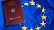 German passport on an EU flag German passport on an EU flag
