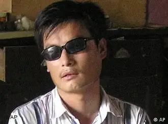 ** FILE ** In this undated file photo released by his supporters, jailed blind activist Chen Guangcheng is seen in a village in China. Chinese authorities on Friday Aug. 24, 2007, barred Chen's wife from leaving the country to accept a humanitarian award on his behalf. Yuan Weijing's passport and telephone were confiscated as she attempted to pass through security at the Beijing airport to fly to the Philippines to attend the Magsaysay Award ceremony. (AP Photo/Supporters of Chen Guangcheng, File)