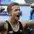 German Fabian Hambuechen celebrates after winning the gold medal in the horizontal bar final at the Gymnastics World Championships in Stuttgart, southern Germany, Sunday, Sept. 9, 2007. (AP Photo/Michael Probst)