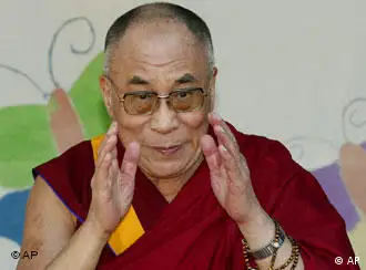 The Dalai Lama looks into the camera