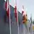 The flags of the 27 members states outside the Lisbon summit venue