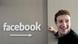 Mann steht neben Wandschild "Facebook" (Quelle: AP) Mann steht neben Wandschild "Facebook" (Quelle: AP)
