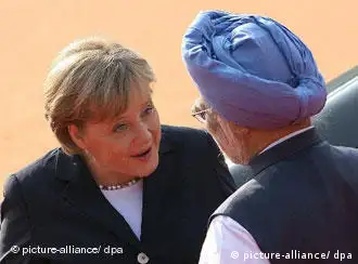 默克尔访问印度，受到印度总理辛格欢迎