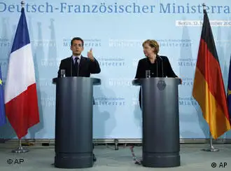 法国总统萨科奇和德国总理默克尔举行记者招待会