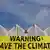 Плакат с надписью "Внимание - спасите климат"
