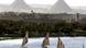 Boats on the river Nile, the pyramids in the background Boats on the river Nile, the pyramids in the background