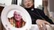 ** FILE ** Bishop Aloysius Jin Luxian, the official Communist Party-recognized bishop of Shanghai, talks to a reporter, sitting near the plate printed with a portrait of Pope Benedict XVI on May 26, 2005 in Shanghai, China. Jin said both China and the Vatican must compromise to normalize relations and end five decades of estrangement. China ordered Catholic to sever ties with the Vatican in 1951 and demands that they worship only in the officially sanctioned church. About 4 million do so, while foreign experts say up to 12 million more worship in the unofficial, or underground, church. (AP Photo) ** FILE ** Bishop Aloysius Jin Luxian, the official Communist Party-recognized bishop of Shanghai, talks to a reporter, sitting near the plate printed with a portrait of Pope Benedict XVI on May 26, 2005 in Shanghai, China. Jin said both China and the Vatican must compromise to normalize relations and end five decades of estrangement. China ordered Catholic to sever ties with the Vatican in 1951 and demands that they worship only in the officially sanctioned church. About 4 million do so, while foreign experts say up to 12 million more worship in the unofficial, or underground, church. (AP Photo)
