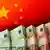 Chinese flag overlayed with Euro bills