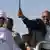 Sudanese President Omar al-Bashir, right