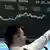 Man pointing at line graph showing Dax progress
