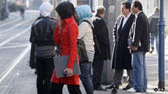 Moslem women with headscarves at a bus stop in Duisburg