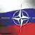 The Russian flag, with the NATO symbol superimposed over it