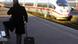 A man stands in front of an ICE train A man stands in front of an ICE train
